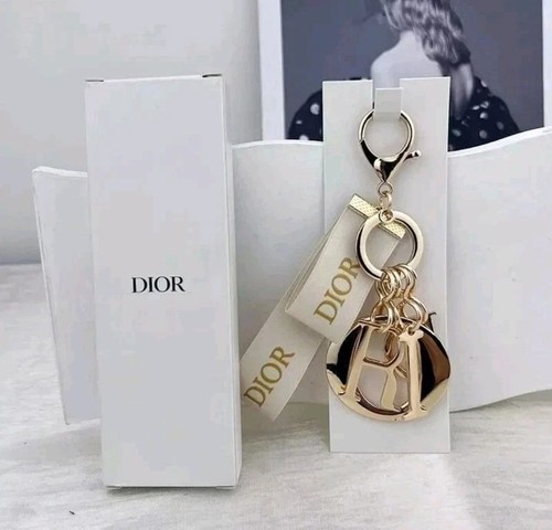 Gold tone luxury bag charm - bag,