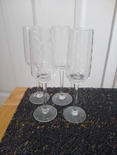 4 Champagne Flutes Possibly