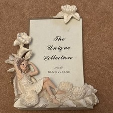 The Unique Collection 4’’ x 6’’ Resin Fairy Shelf Sitting Photo Frame