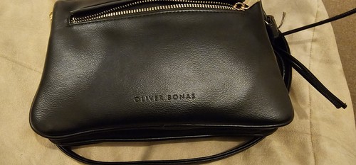 Oliver bonas black leather - oliver,