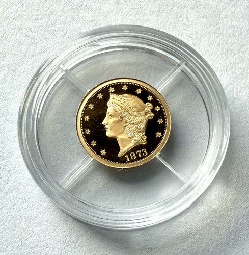 Solid gold 1873 - solid, double