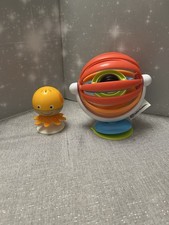 Baby Einstein Sticky Spinner suction toy and Hape orange octopus suction toy 