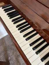 Reid Sohn Upright Piano American Walnut High Pollish. Excellent Condition