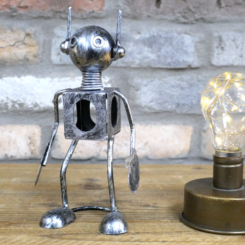 Silver metal robot - metal, “rusty”
