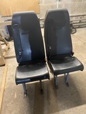 Two seats with seat belts for van or camper conversion.