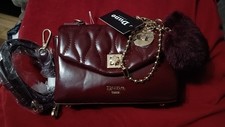 Dune Burgundy handbag with a
