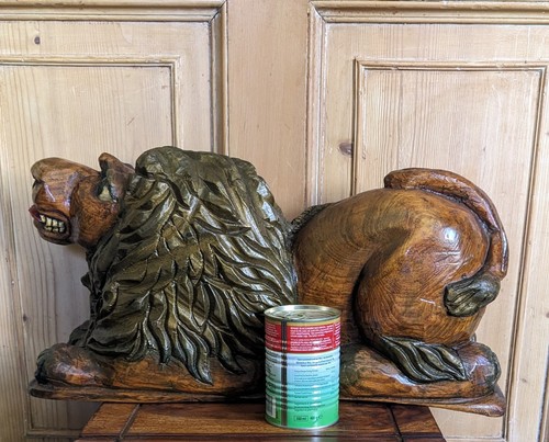 Hand carved and painted - and,