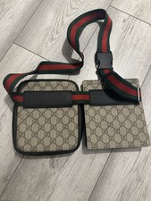 Gucci Monogram Double belt bag. Adjustable strap in green and red striped woven