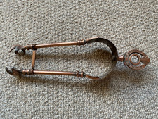 old metal  hand  Coal Tongs
