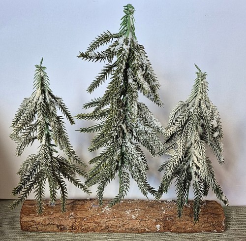 Triple snow covered pine trees - covered,