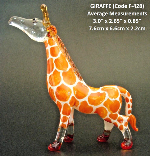 Blown orange glass giraffe - glass,