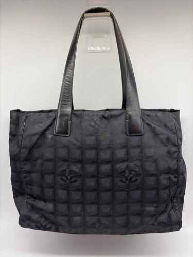 Pre owned chanel black tote - black,