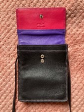 Graffiti small black leather crossbody bag, pink interior,  6" x 4 3/4"