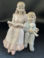 Girl and Boy Figurine The