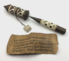 Tibetan prayer wheel with scroll