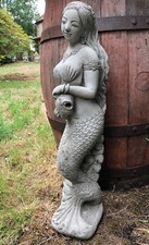 Mermaid stone water feature