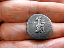 ROMAN. The Triumvirs. Octavian. Autumn 32-31 BC. Apollo seated on rock  Ref: 43