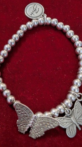 Silver tone bracelet - bracelet, by