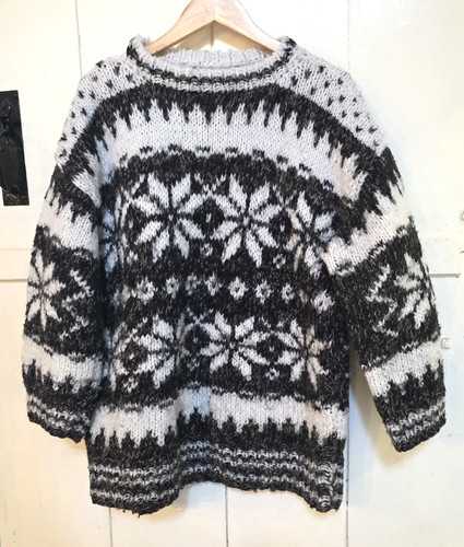 Hand knitted wool snowflake - hand,