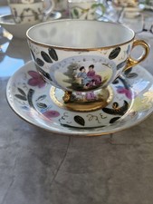 Vintage Threelegged Cup And Saucer Set 