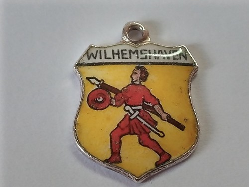 Silver travel shield charm