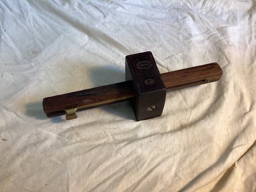 Rosewood and brass - and,