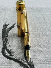 Cartier Fountain pen, solid 18k M nib, gold plated fluted design, original box