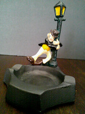 Drunk Leaning on a Street Lamp