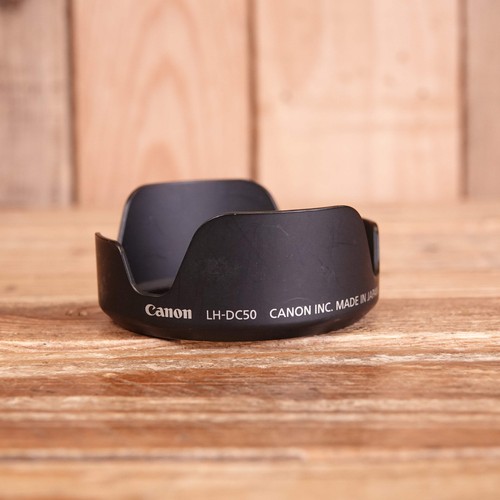 Used canon dc50 - lens, hood