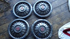 4 Chrome Wire Wheel Plastic  Hubcaps Oldsmobile?? classic car etc