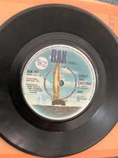 MUD   LONELY THIS CHRISTMAS.     7” vinyl .  RAK  records.  1974