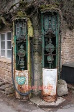 PHOTO  OLD PETROL PUMPS IN