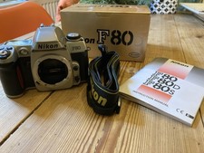 Nikon F80D camera + Nikkor AF 28-100mm f3.5-5.6G lens + Lowepro carrying case