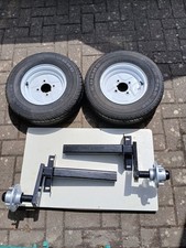 TRAILER SUSPENSION UNITS HUBS AND WHEELS 10" WITH AXLE BEAM.