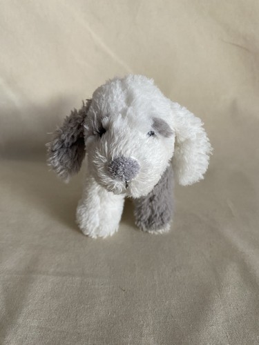 The little white company dog - white,