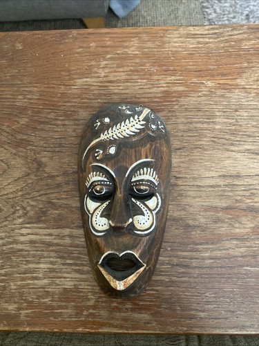 Wooden hand carved face wall - hand,