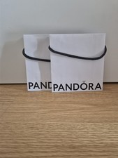 2 Pandora Bags And Guest Paper Inside