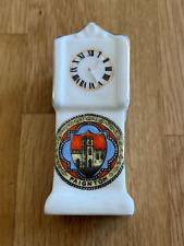 crested grandfather clock -