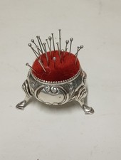 silver pin cushion
