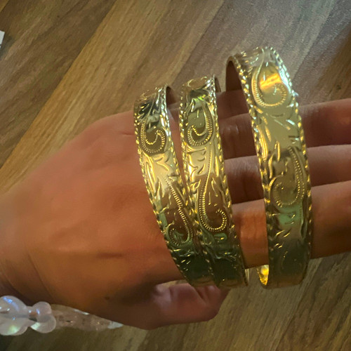 Gold tone engraved metal - tone,