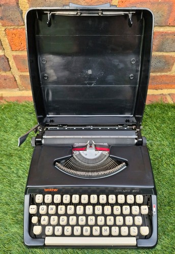 Brother deluxe 220 portable - brother,