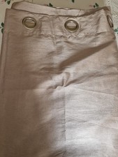 Beige lined eyelet curtains