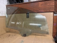 FIAT PUNTO EVO 2011 5 DOOR   O/S DRIVERS FRONT DOOR DROP GLASS GREEN TINT