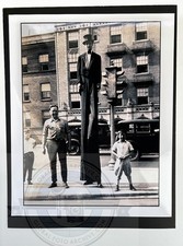 1930s Man on Stilts In Tuxedo