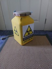 Original  prop " BOND 007 World is not enough  plastic Radioactive  Red Top Cont