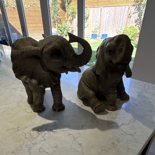 Pair elephant ornament - of,