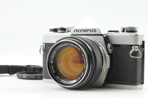 Exc olympus om - ,