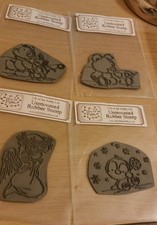 Lili of the valley Christmas rubber stamps ,bears,angel ,penguin.