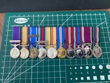 10 MINIATURE MEDALS COURT