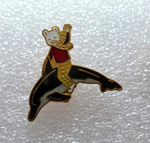 Rupert bear riding dolphin - rupert, a